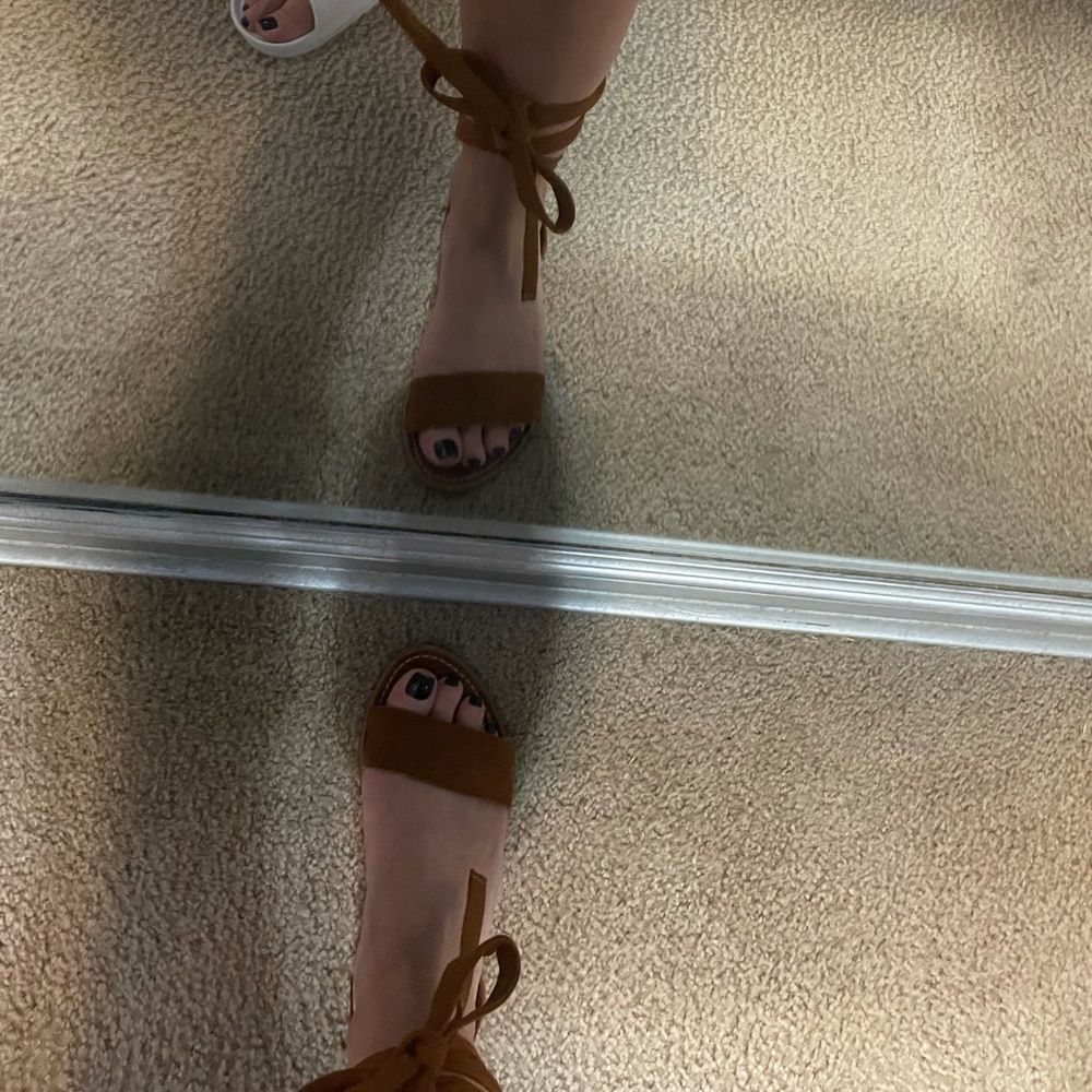 Steve Madden brown tie up sandals.